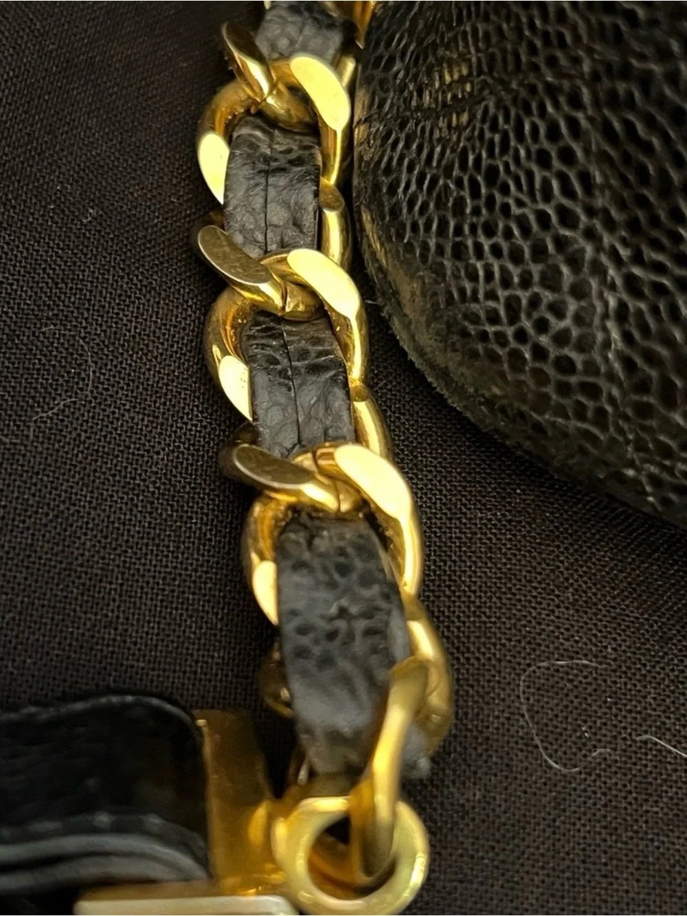 CHANEL Black Quilted Leather Backpack with Gold CC Accent